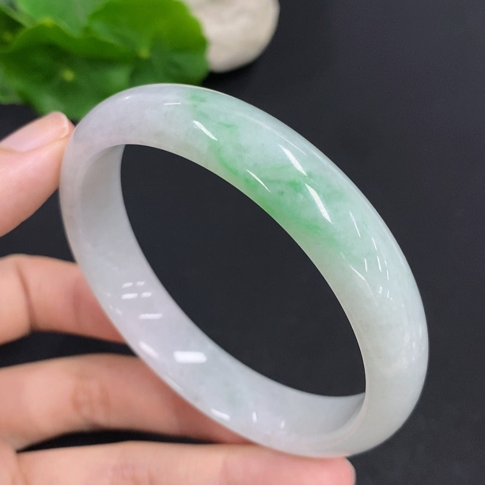 Jadeite round bracelet from HKHQ, weighing 50.5g with a 60mm size, showcasing smooth, polished jade gemstones.