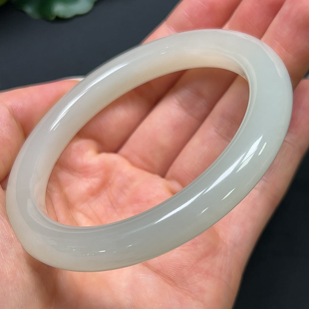 HKHQ Hetian Jade round bracelet with size 58.7mm and 46.12g weight, featuring smooth, polished green jade beads.