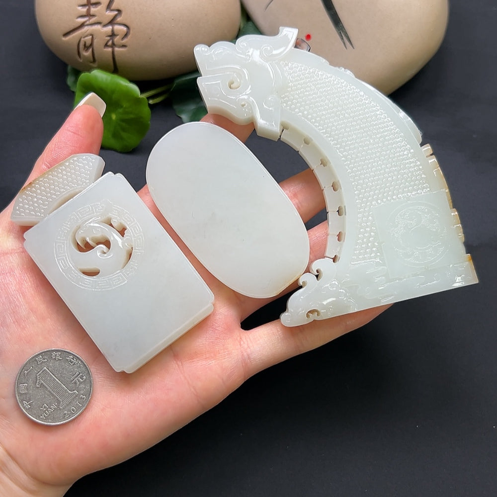 Hetian Jade Chinese Dream ornament by HKHQ featuring a smooth, polished jade carving with intricate traditional design.