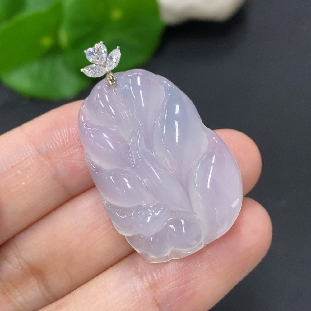 Jadeite nine-tailed fox pendant necklace with 18K gold clasp, featuring intricate jade carving and detailed fox design.