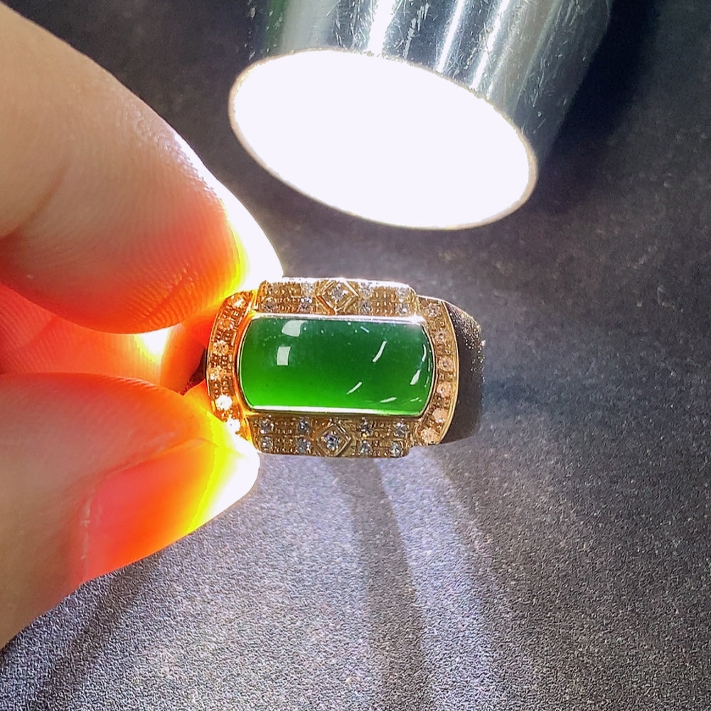 Elegant jadeite and diamond ring set in 18K gold, showcasing intricate design and sparkling gemstones from HKHQ.