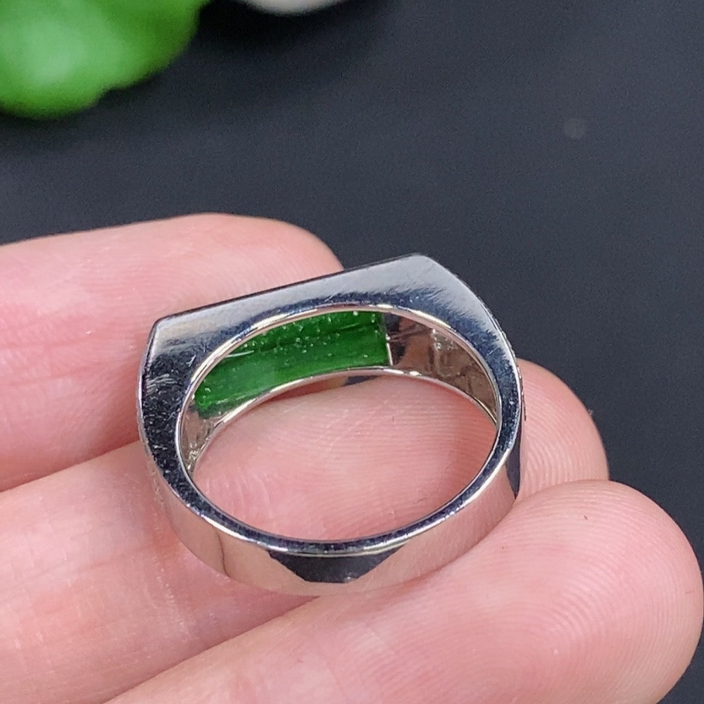 14K gold Jadeite cabochon ring with diamond accents, showcasing a smooth green gemstone set in elegant jewelry design.