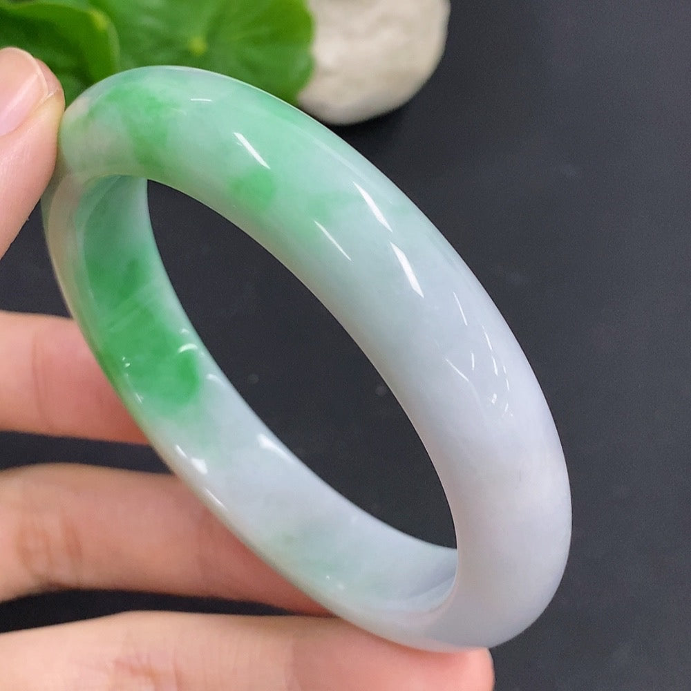 HKHQ jadeite round bangle, 60.6g weight, size 57.3mm, featuring smooth, polished jadeite surface and elegant circular design.