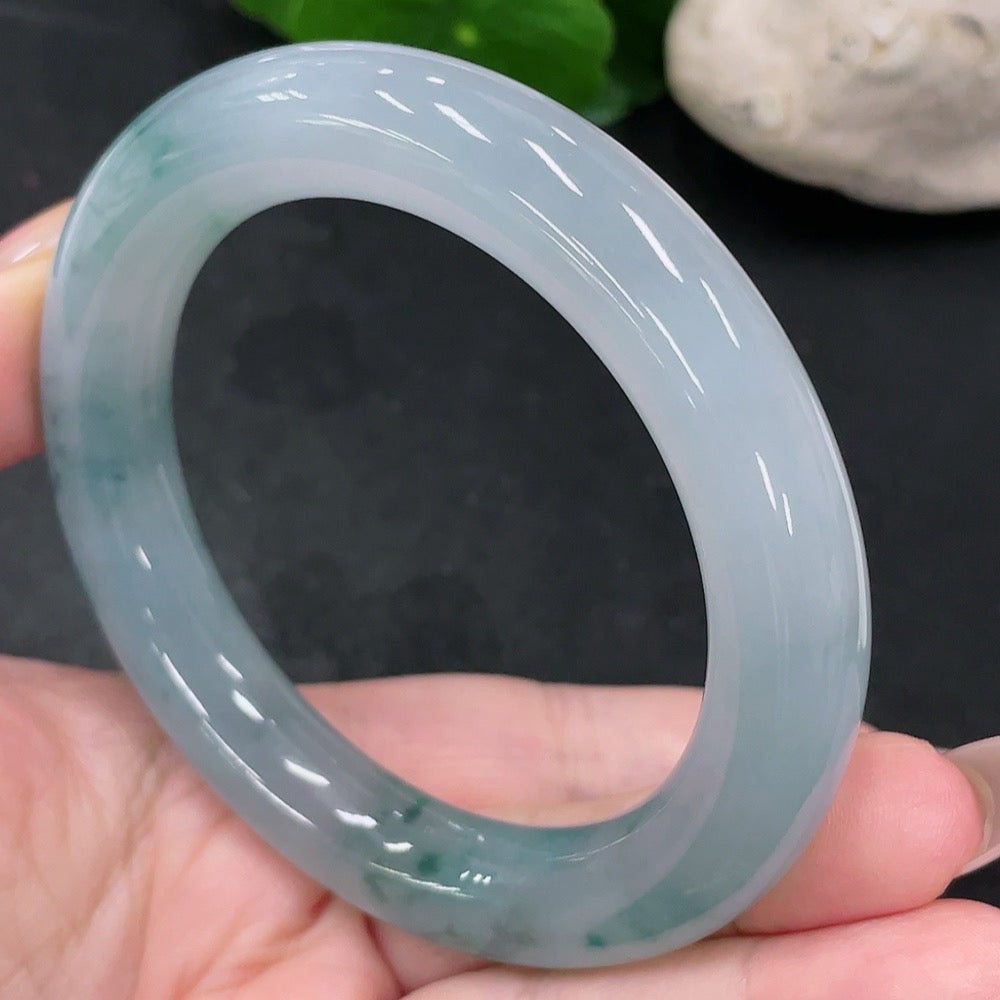 HUILIU HQ jadeite round bangle in size 56.8 with a total weight of 74.9g, showcasing smooth, polished green jade surface.