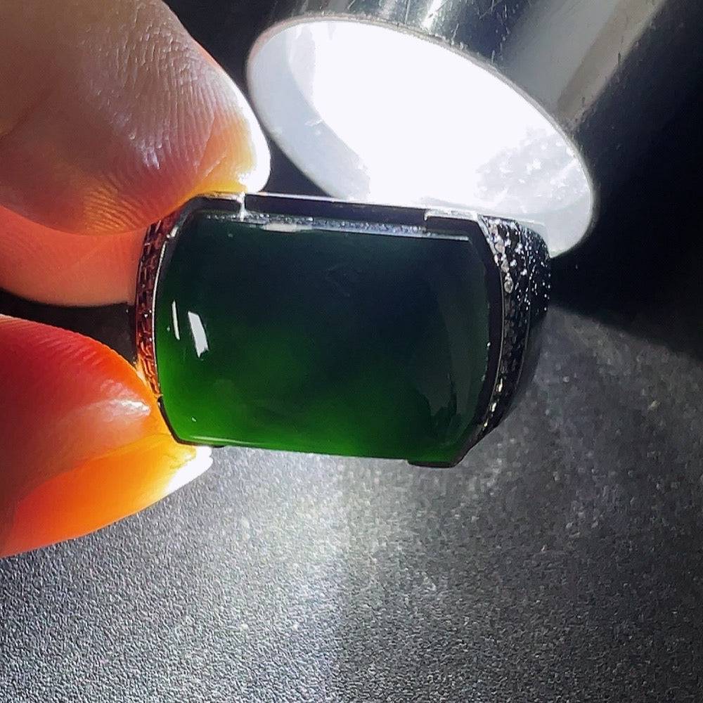 HUILIU HQ jadeite ring with diamond accents, showcasing a polished green jade gemstone and sparkling diamond details.