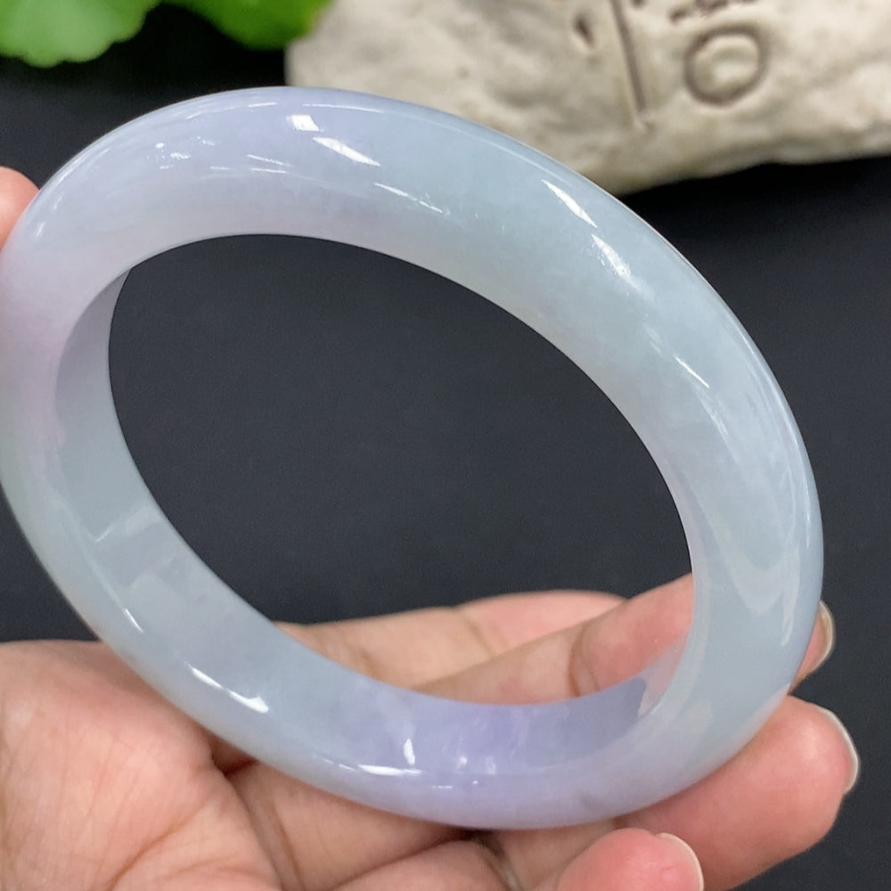 HKHQ jadeite round bangle with 67.3g weight and size 58.7, featuring smooth, polished jadeite surface and classic bracelet design.