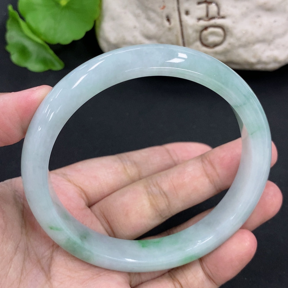 HKHQ jadeite round bracelet weighing approximately 59.8g and 63.5mm in size, featuring smooth, polished jadeite beads.