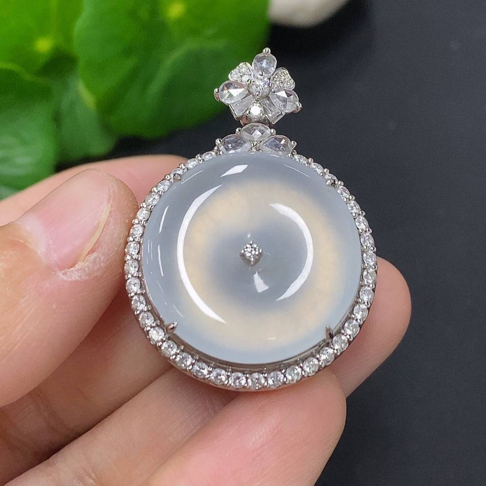 Huiliu Jadeite pendant accented with a large diamond, showcasing a glossy green jade stone on a delicate chain.