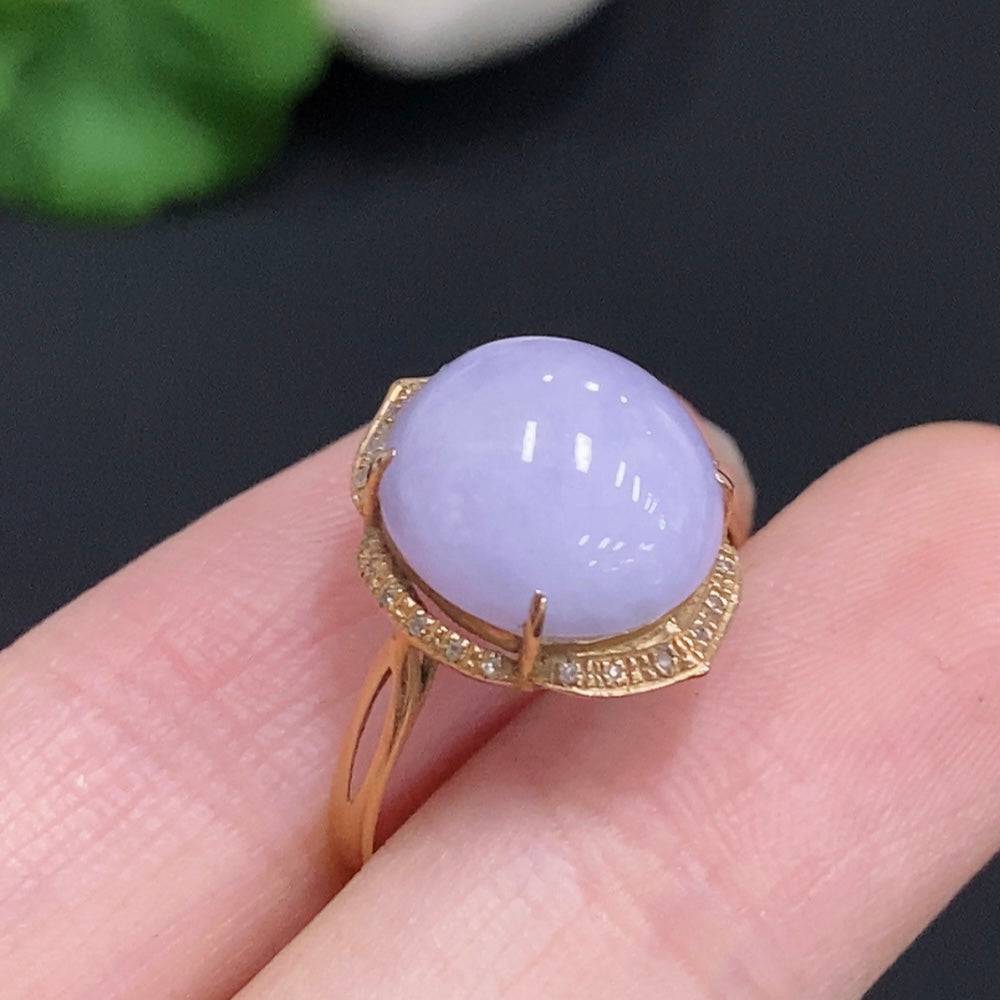Huiliu Jadeite cabochon ring featuring a smooth, polished green jade stone set in a silver band, handcrafted jewelry piece.