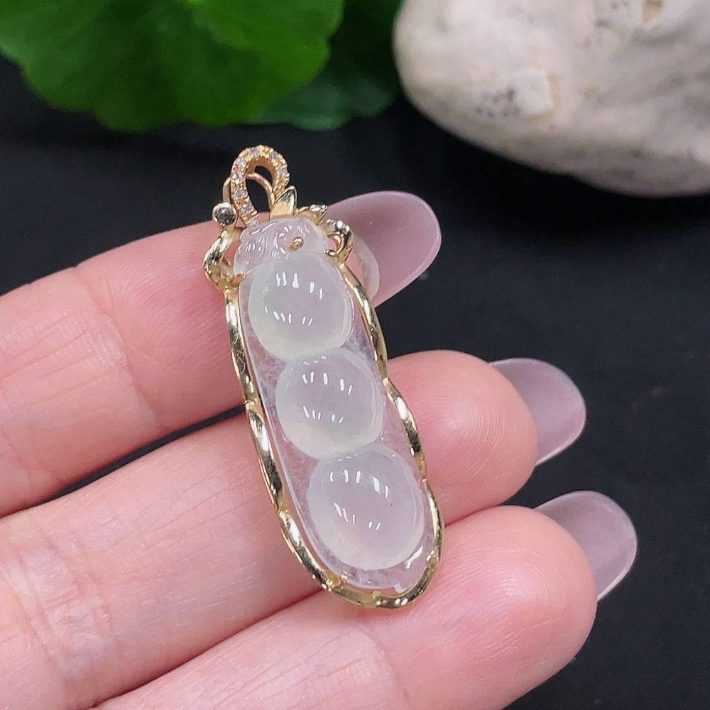 Huiliu Jadeite Fu Dou pendant with diamond accents, showcasing a smooth green jadeite jade figure on a delicate cord.