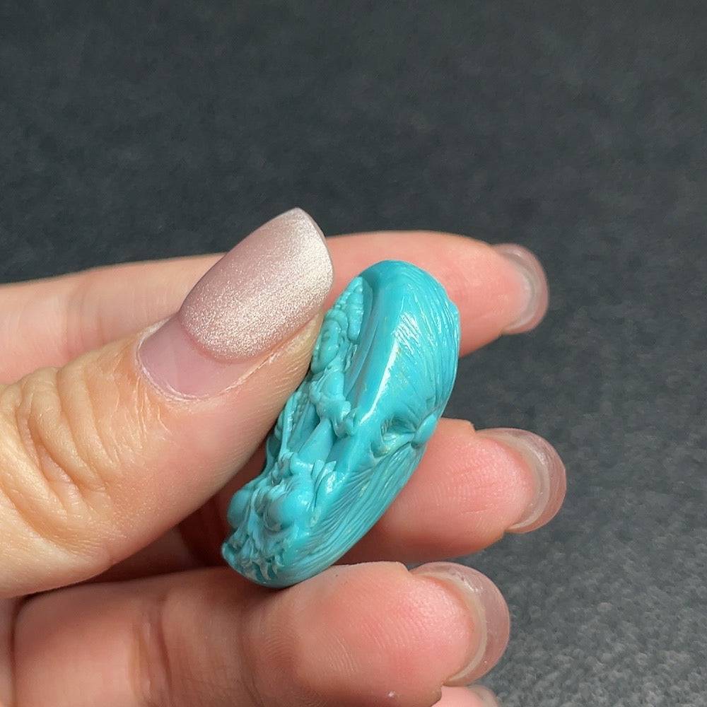 Turquoise gemstone pendant from HUILIU HQ, weighs approximately 10.2g, featuring vibrant blue-green gemstone.