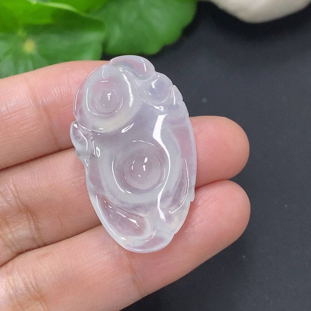 Huiliu Jadeite Buddha pendant, carved jade jewelry with intricate details, showcasing a serene Buddha figure.