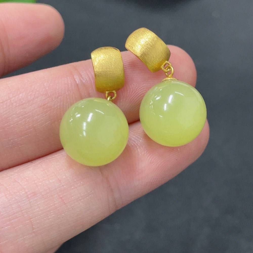 Hetian jade inlaid earrings with 18K gold setting, approximately 11.8mm in size, crafted by HUILIU HQ.