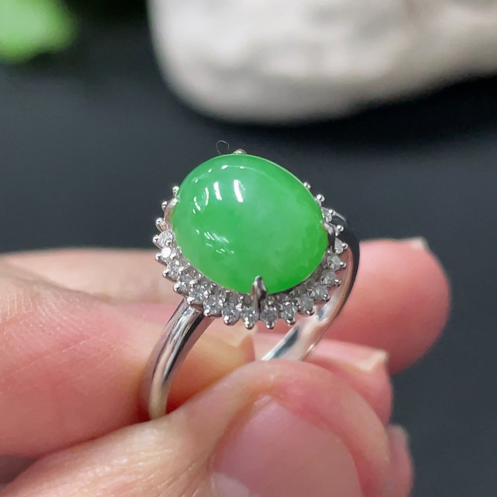 Huiliu Jadeite cabochon ring with diamond accents, featuring a polished green jade gemstone and elegant silver band.