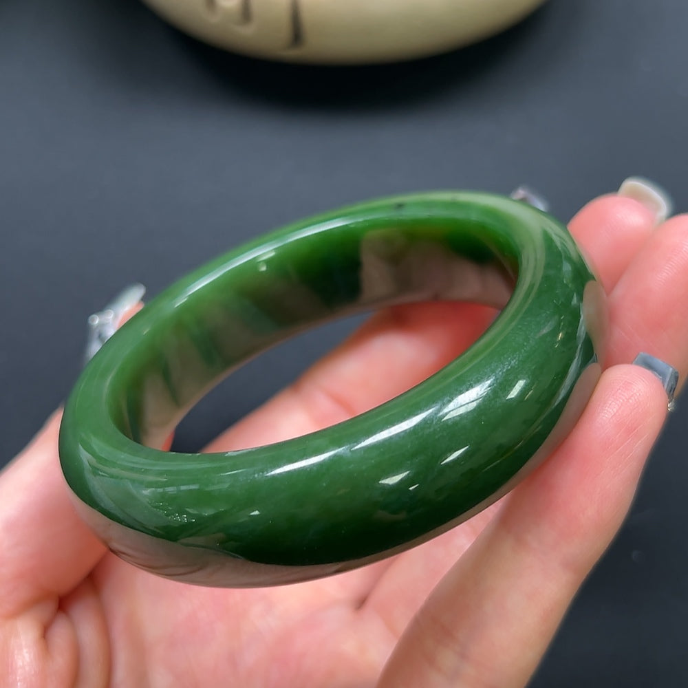 HKHQ Hetian Jade round bracelet, 53.6mm, 75.3g, showcasing smooth, polished green jade beads on a stylish jewelry piece.