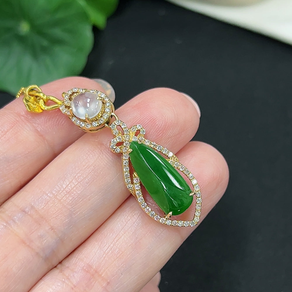 Jadeite inlaid pendant with 18K gold and diamond accents, featuring a jade stone, on a gold chain, weighing approx. 7.5g.