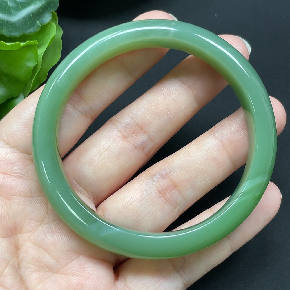 HKHQ Hetian Jade round bracelet with 56.1mm diameter and 44.72g weight, showcasing smooth, polished jade beads.