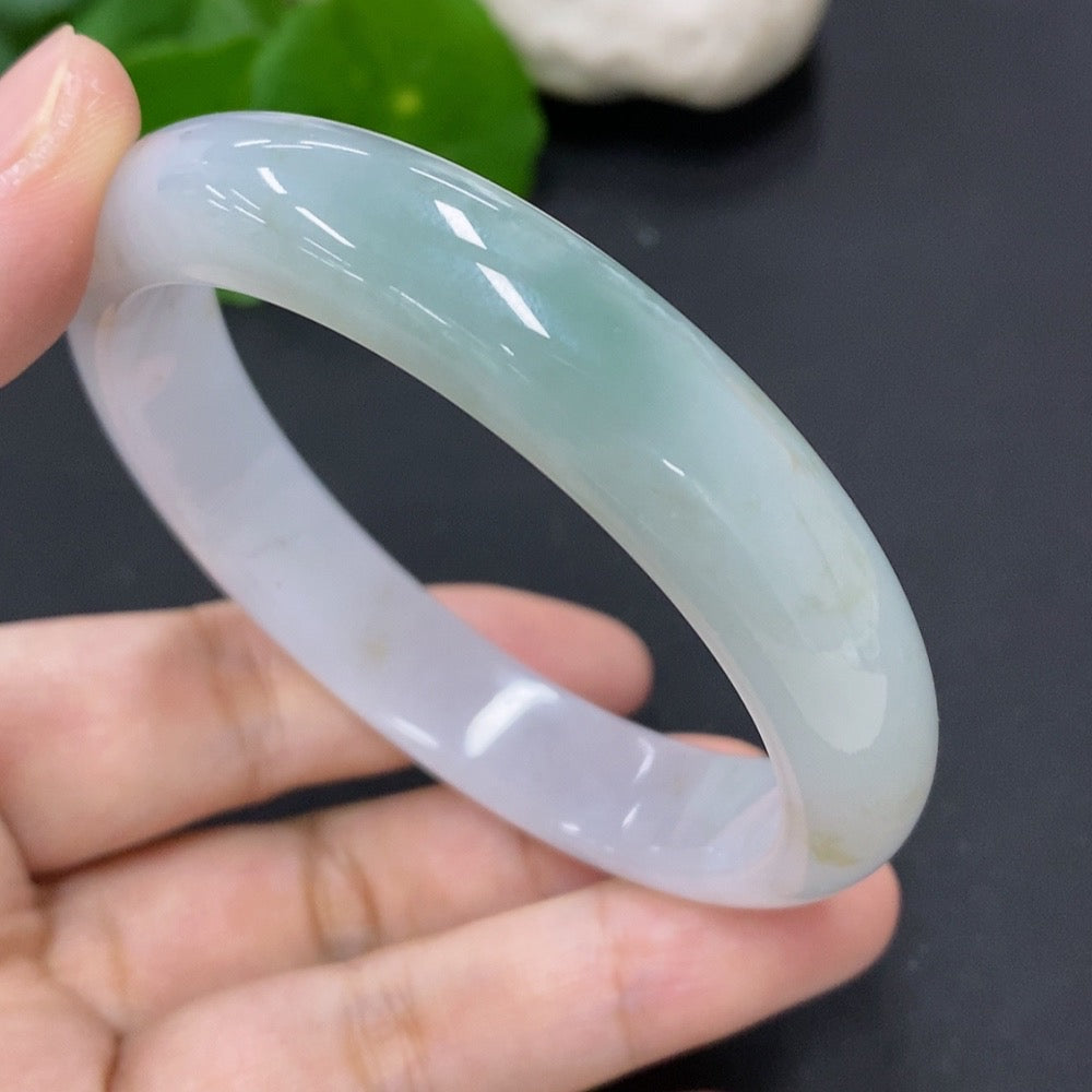 Jadeite round bangle with a total weight of 53g and size 58.7, featuring smooth, polished jadeite in a circular design.