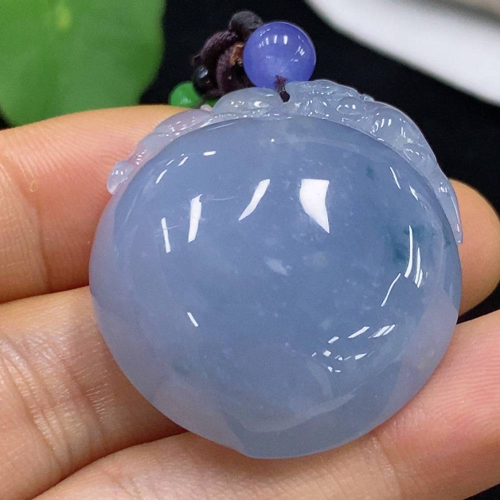 Jadeite monkey offering longevity pendant from HUILIU HQ, featuring detailed jade carving and symbolic design.