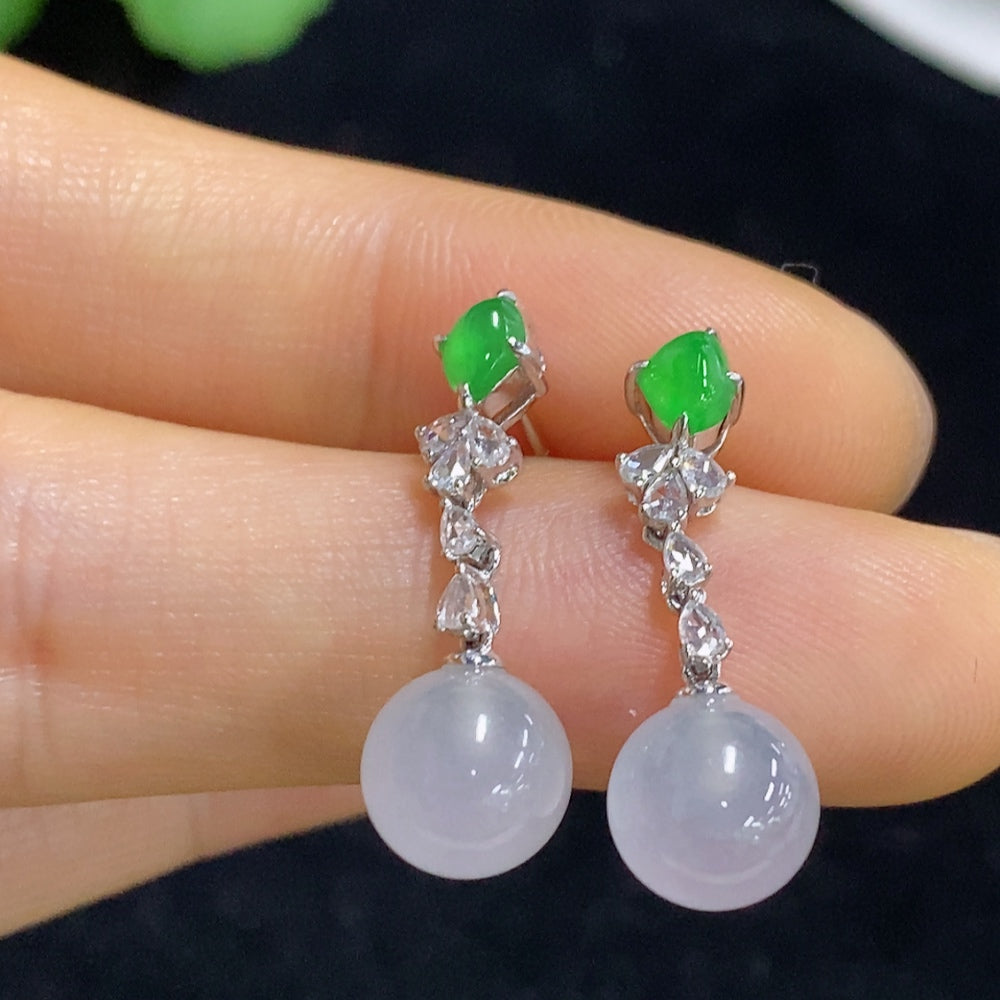 Jadeite earrings set in 18K gold with diamond accents