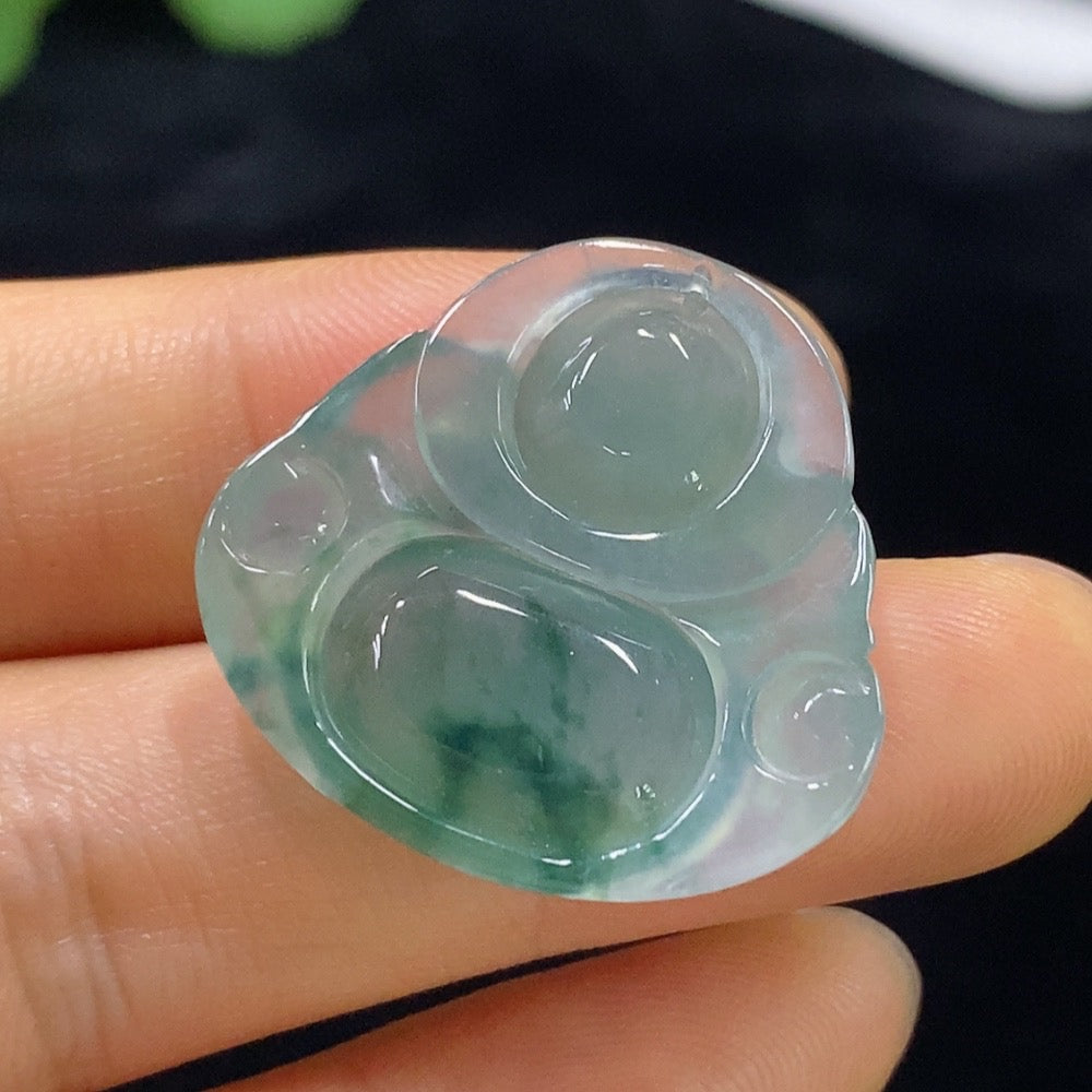 Jadeite Buddha pendant from HUILIU HQ, featuring a detailed carved Buddha figure on smooth green jade, weighs approximately 5.96g.