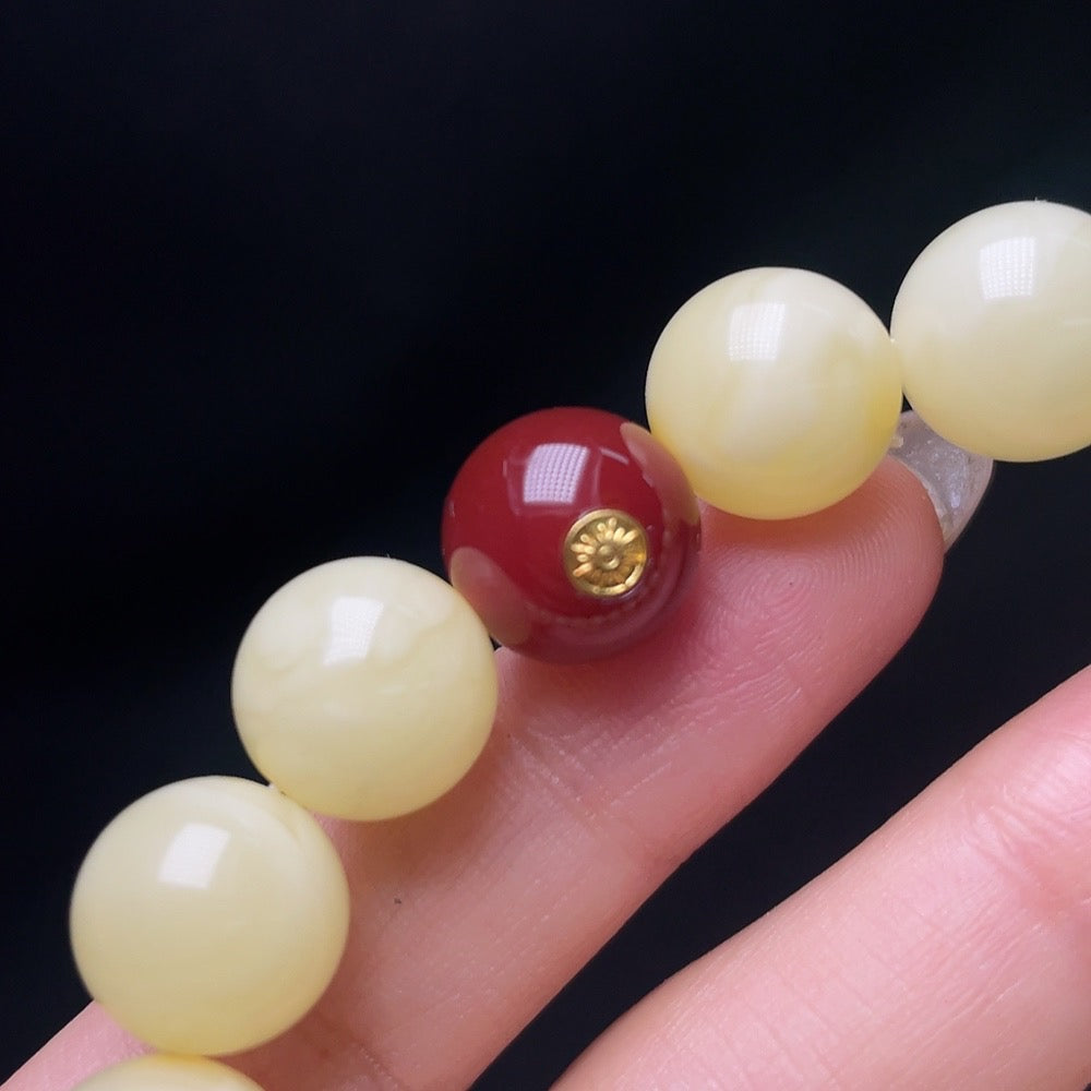 Huiliu Amber beeswax bracelet with non-natural stones, approximately 12.3mm size, natural amber beads with decorative stones.