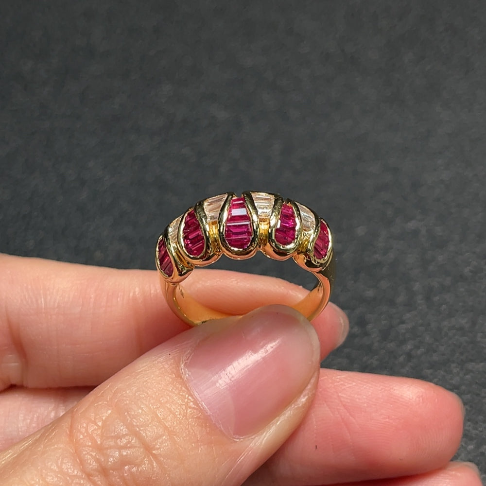 Huiliu Ruby ring with diamond accents, showcasing a vibrant gemstone set in a polished band.