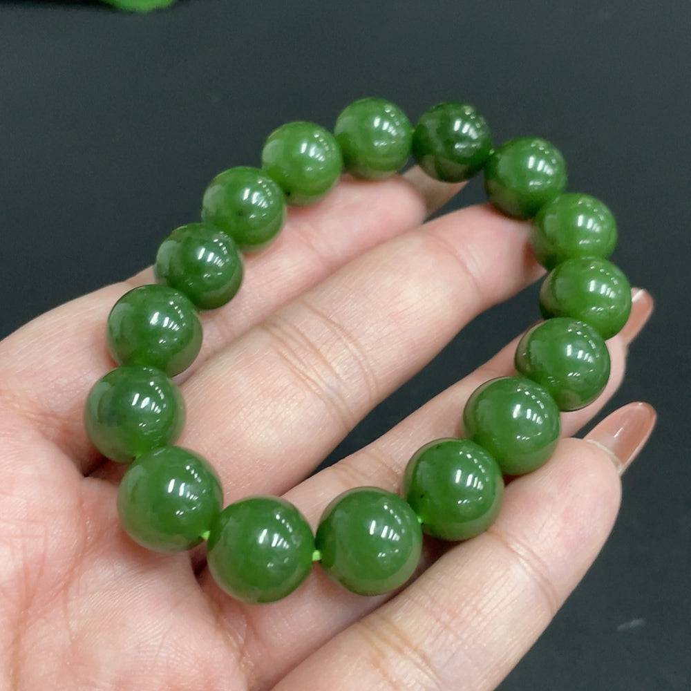 Hetian Jade Jasper bracelet with 11.5mm beads, crafted by HUILIU HQ, showcasing smooth, polished jade stones in a stylish jewelry piece.