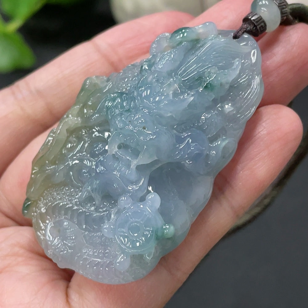 Jadeite dragon soaring pendant with intricate dragon design, weighing approximately 46.3g, from HUILIU HQ Master Collection.