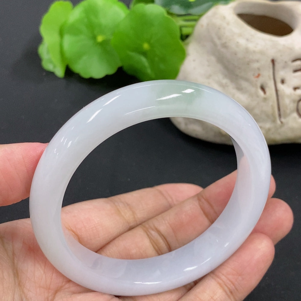 HKHQ jadeite round bracelet weighing 53.57g with a size of 55.7mm, showcasing polished green jade beads.