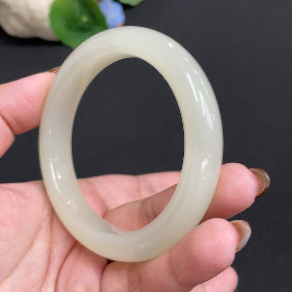 Hetian jade round bracelet by HUILIU HQ with size 58.7 and weight approximately 61.2g, featuring smooth, polished jade beads.