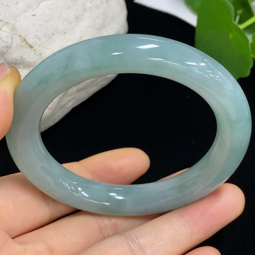 HKHQ jadeite round bangle in size 53.8 with a 57.98g weight, showcasing smooth, polished jadeite craftsmanship.