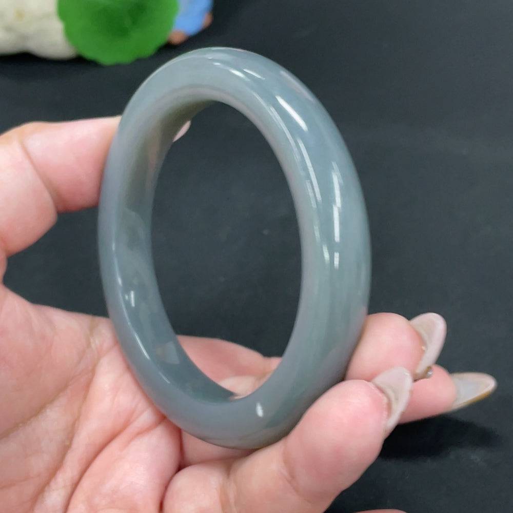 Huiliu certified Hetian jade round bracelet featuring smooth, polished jade beads on a delicate string.