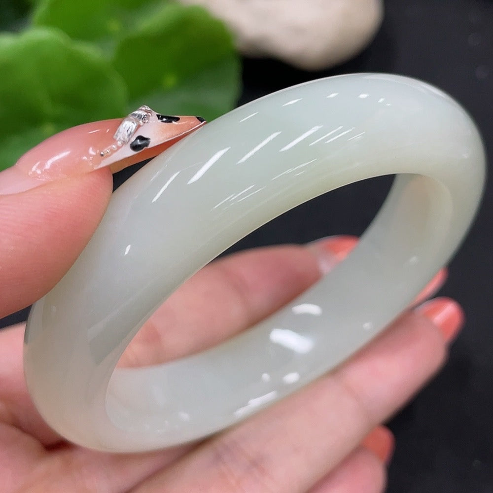 HUILIU HQ Hetian Jade round bangle, size 55.1, weighing approximately 58.4g, showcasing smooth, polished green jade surface.