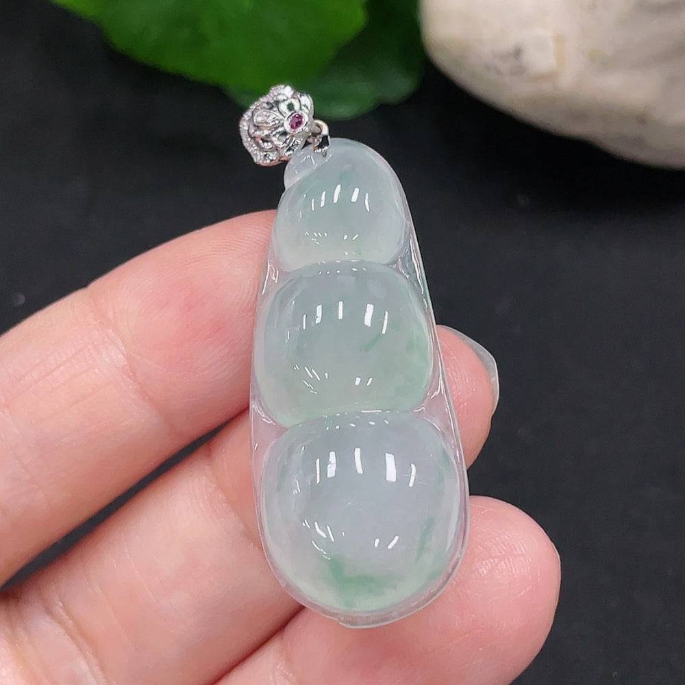 Jadeite Lucky Bean Pendant by HUILIU HQ with 18K gold and diamond accents, showcasing the detailed carved jade pendant.