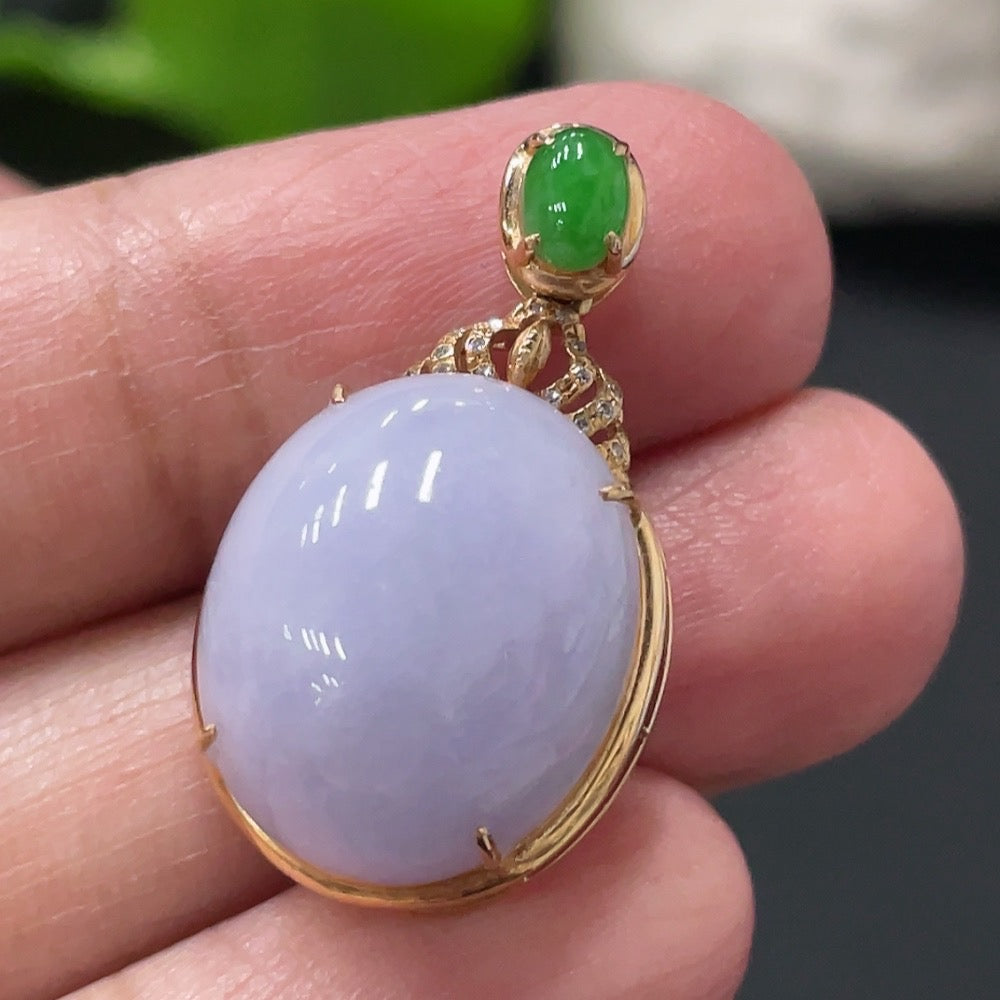 Huiliu Jadeite inlaid cabochon pendant with diamond accents, featuring a polished jadeite stone and intricate design.