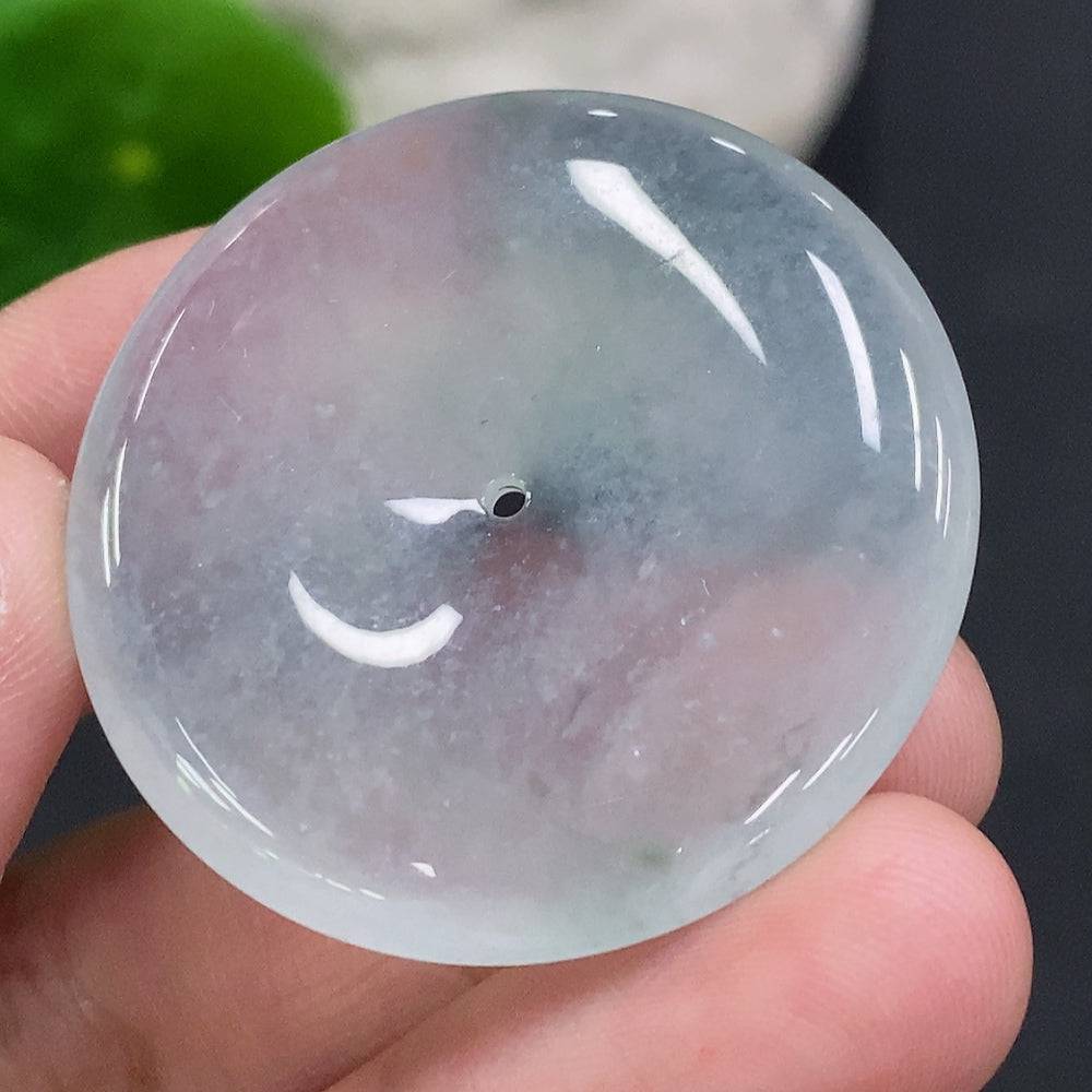 Jadeite Peace button by HUILIU HQ featuring a carved jade green peace symbol on a smooth jade surface.