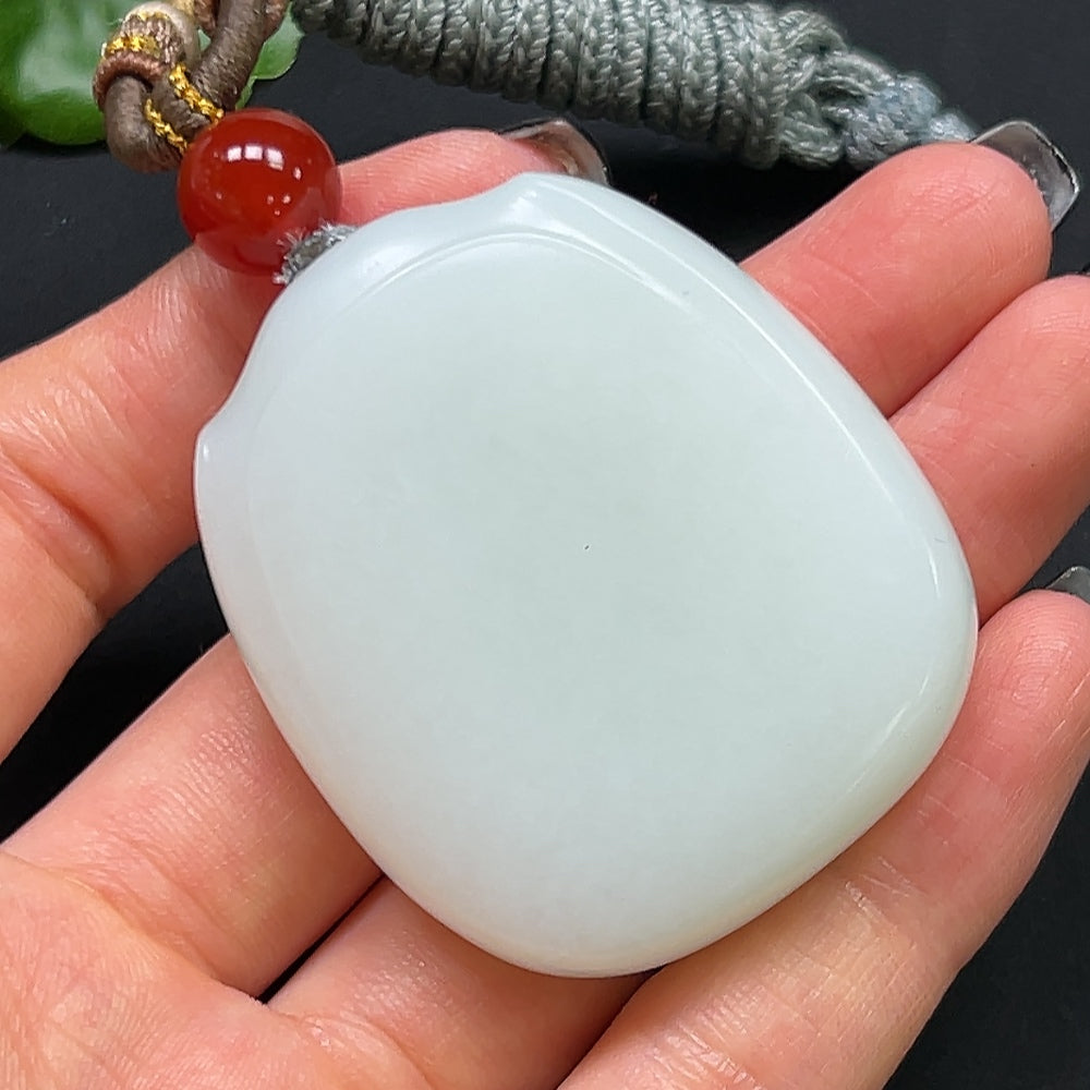 Hetian jade plain pendant with rope necklace from HKHQ, showcasing smooth, polished jade in a simple pendant design.