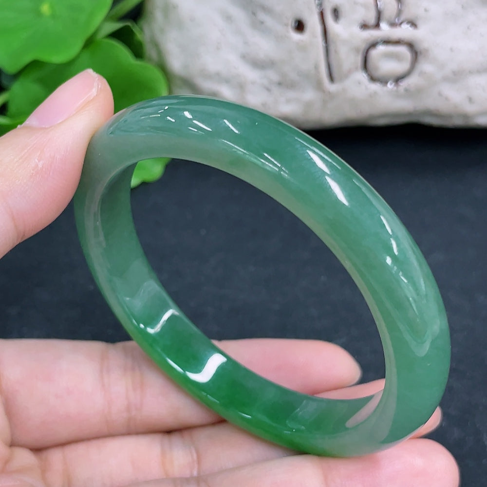 HKHQ jadeite round bangle in size 54, weighing 38.5g, showcasing smooth green jadeite with polished finish.