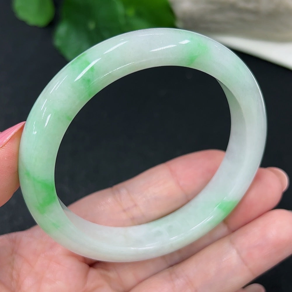 HKHQ jadeite round bangle, size 56, showcasing smooth green jadeite with a polished finish, weighing 51.3 grams.