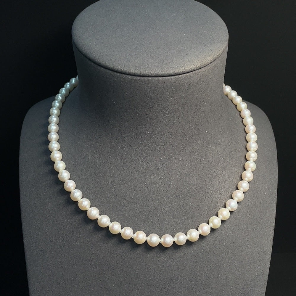 Pearl necklace with 18K gold-marked clasp, red beads, and gold-plated beads, approximately 6.9mm in size, weight 29.9g.