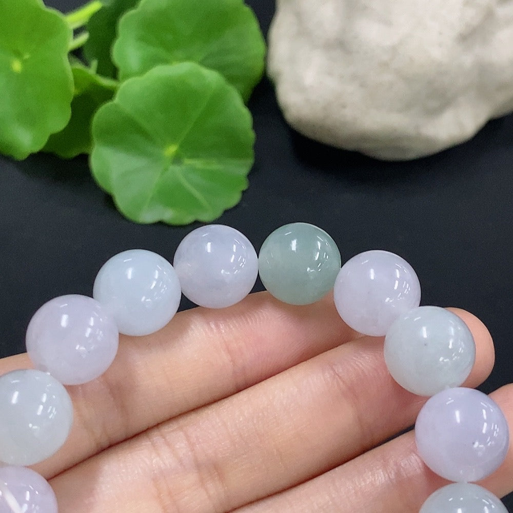 HKHQ jadeite bracelet, 48.59g, featuring smooth, polished jadeite beads arranged in a stylish bracelet design.