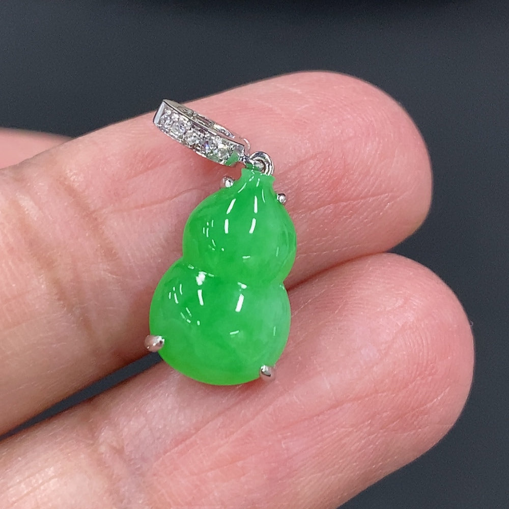 Jadeite gourd pendant with 18K gold inlay and diamond accents, lightweight jewelry piece by HKHQ.