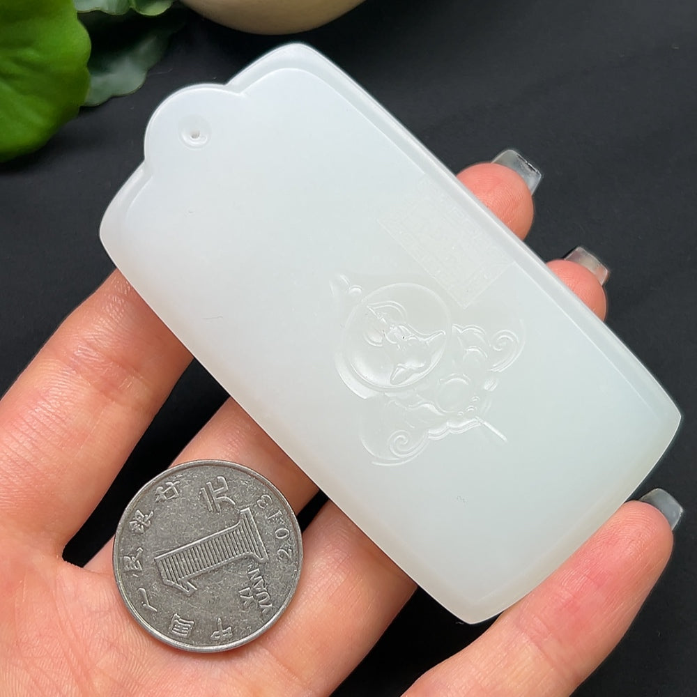 Hetian Jade Guanyin pendant necklace by HKHQ featuring a detailed carved Guanyin figure on a jade pendant.
