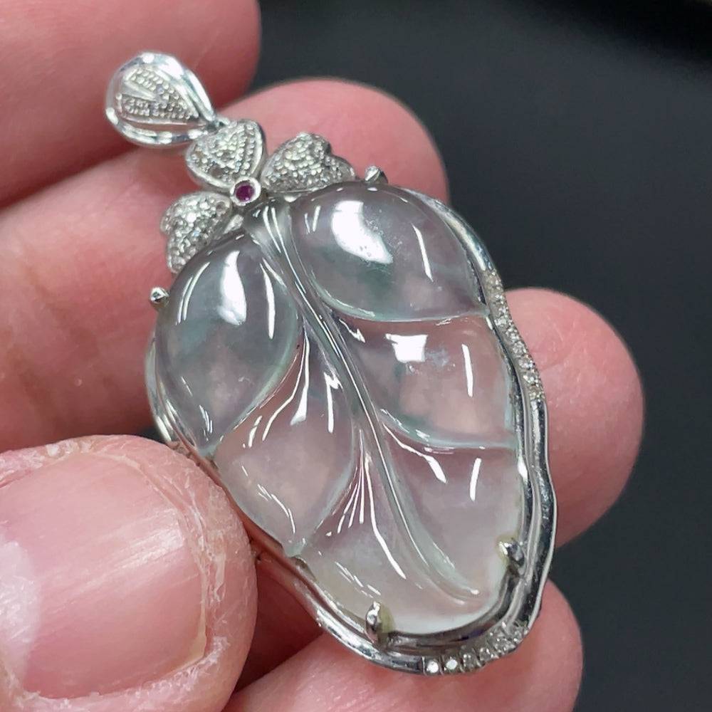 Jadeite leaf inlay pendant with 18K gold and diamond accents, weighing approx. 3.8g, featuring intricate jade jewelry design