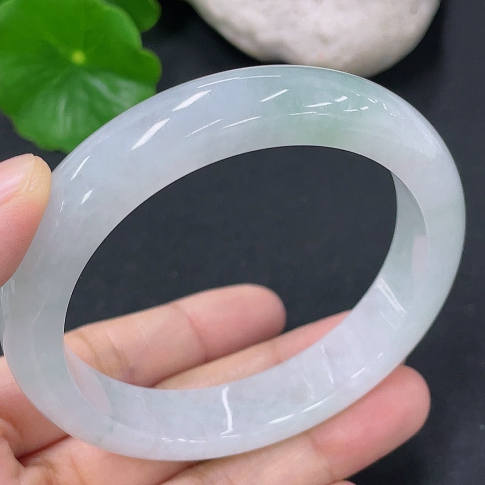 Jadeite round bangle in size 54.5mm with a total weight of 50.76g, featuring smooth, polished jadeite from HKHQ.