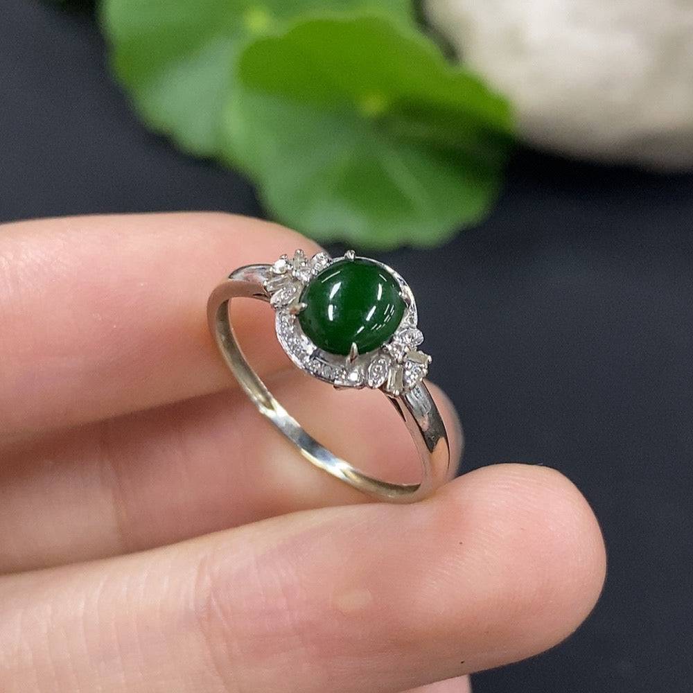 HUILIU HQ jadeite cabochon ring with diamond accents, featuring a smooth green jade stone and sparkling diamond details.