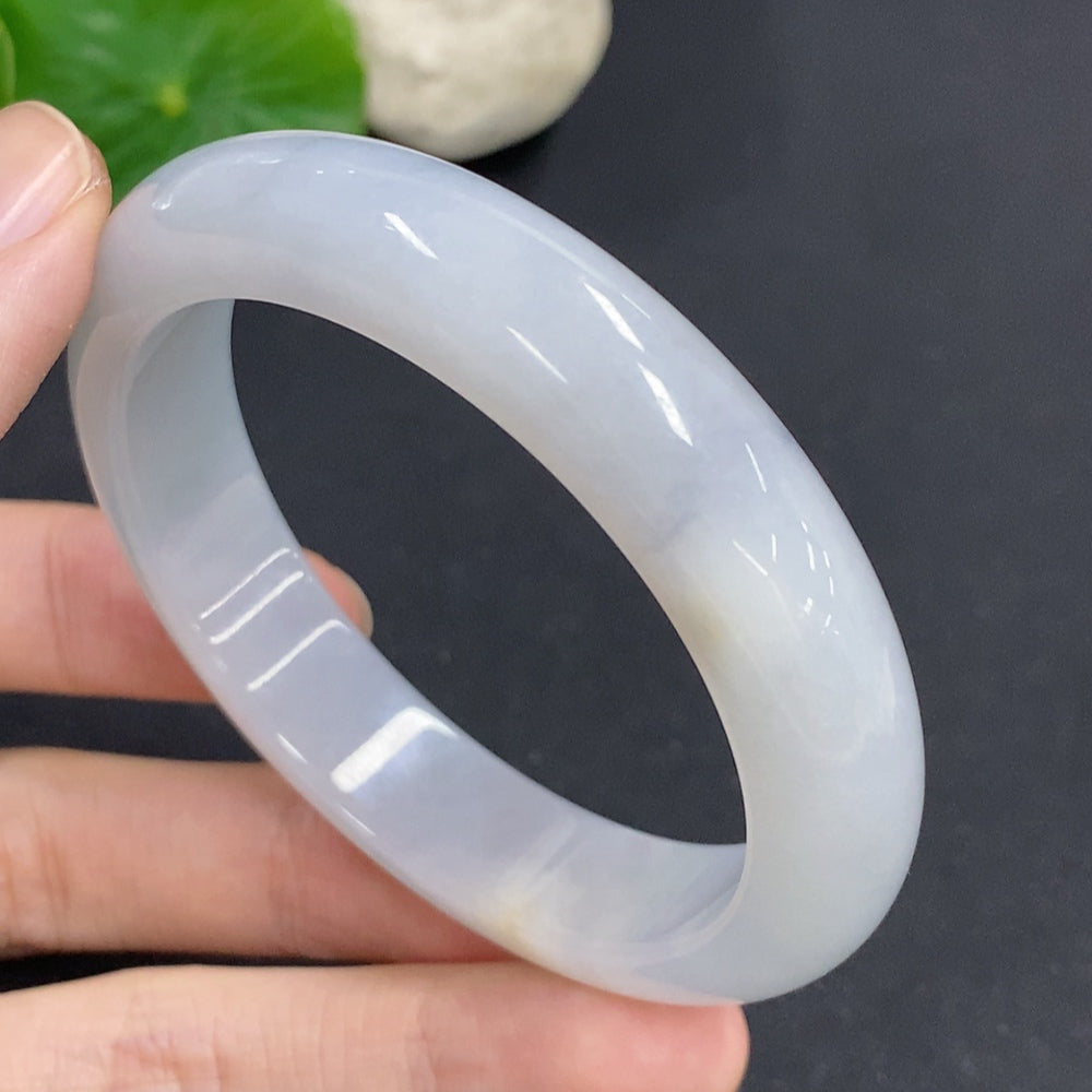 HKHQ jadeite round bangle in size 54, showcasing smooth, polished jadeite with a glossy finish and a weight of 51.5 grams.