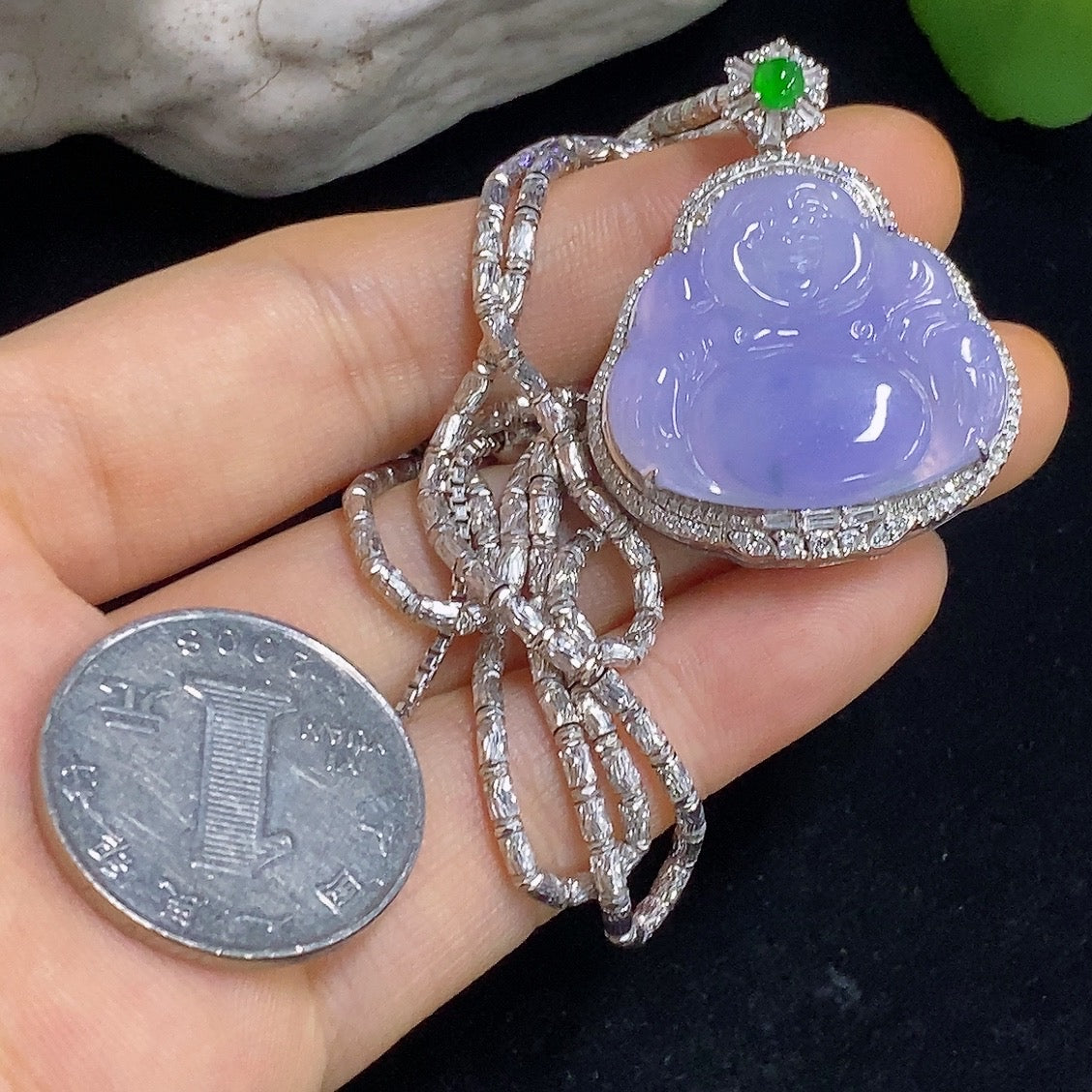 Jadeite Buddha pendant necklace by HKHQ featuring 18K gold and diamond accents, showcasing intricate craftsmanship and elegant design.