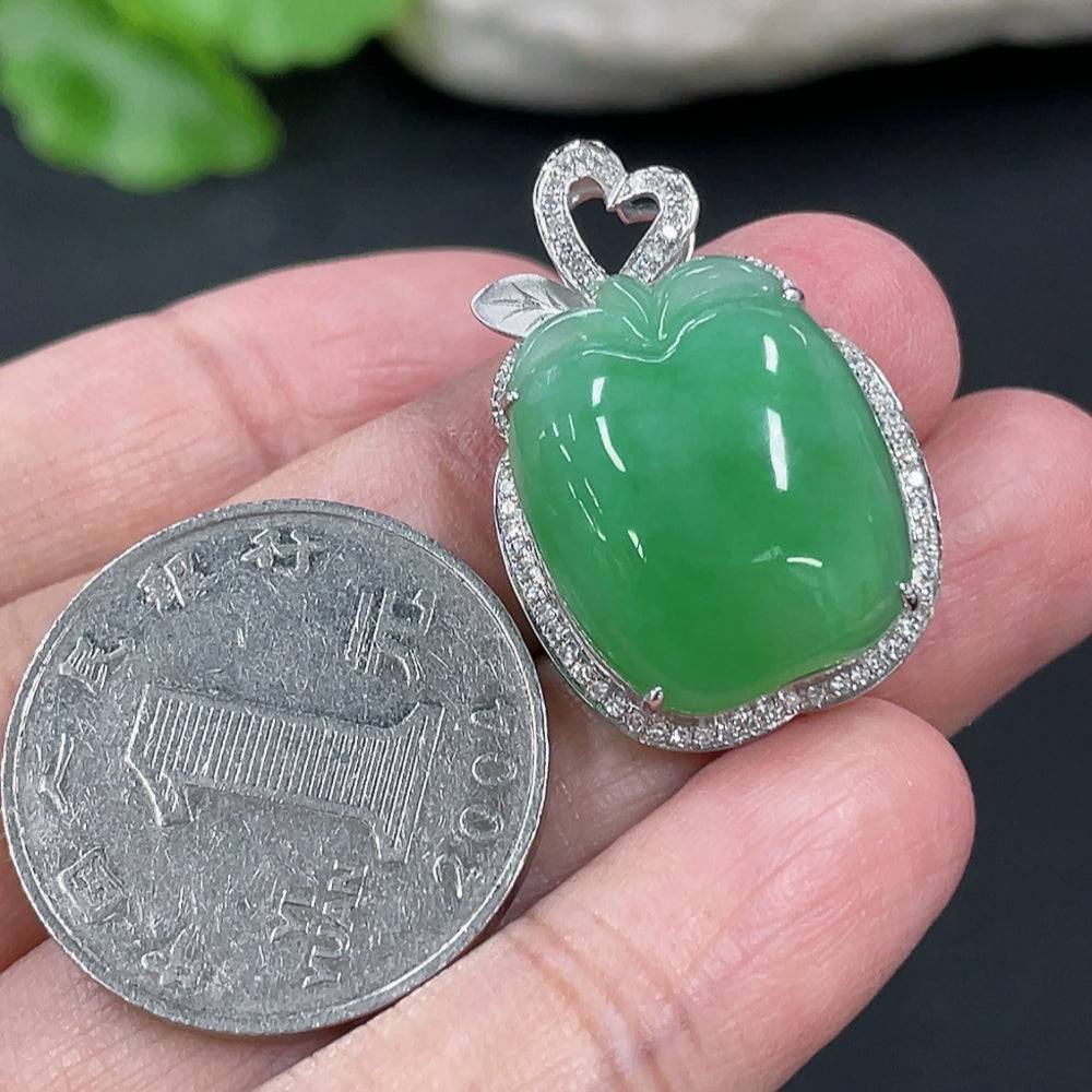 Huiliu Jadeite apple pendant set with diamond accents, featuring a polished jadeite jewelry piece with sparkling diamond details.